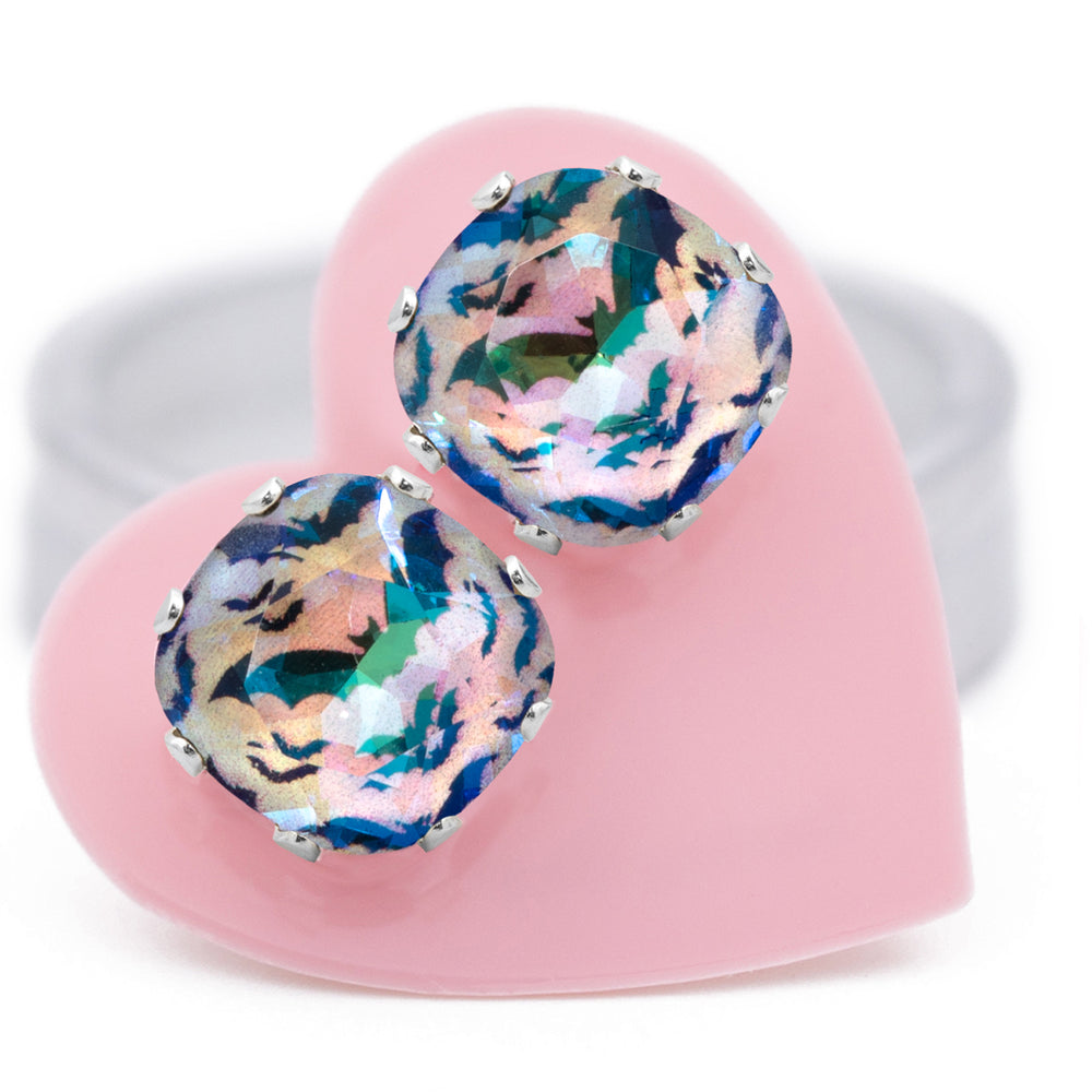 Bat Chick Crazy Cushion stud earrings set in .925 Sterling Silver for spooky, lightweight sparkle, carded on a pink heart.