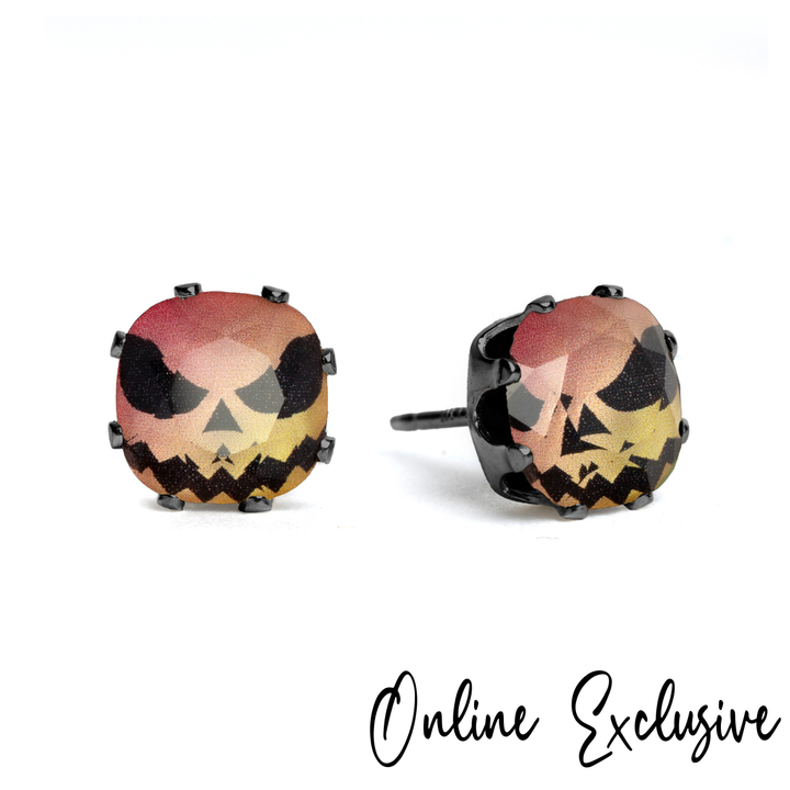 Hi Jack! Cushion stud earrings in playful pink and orange crystals, set in hematite.
