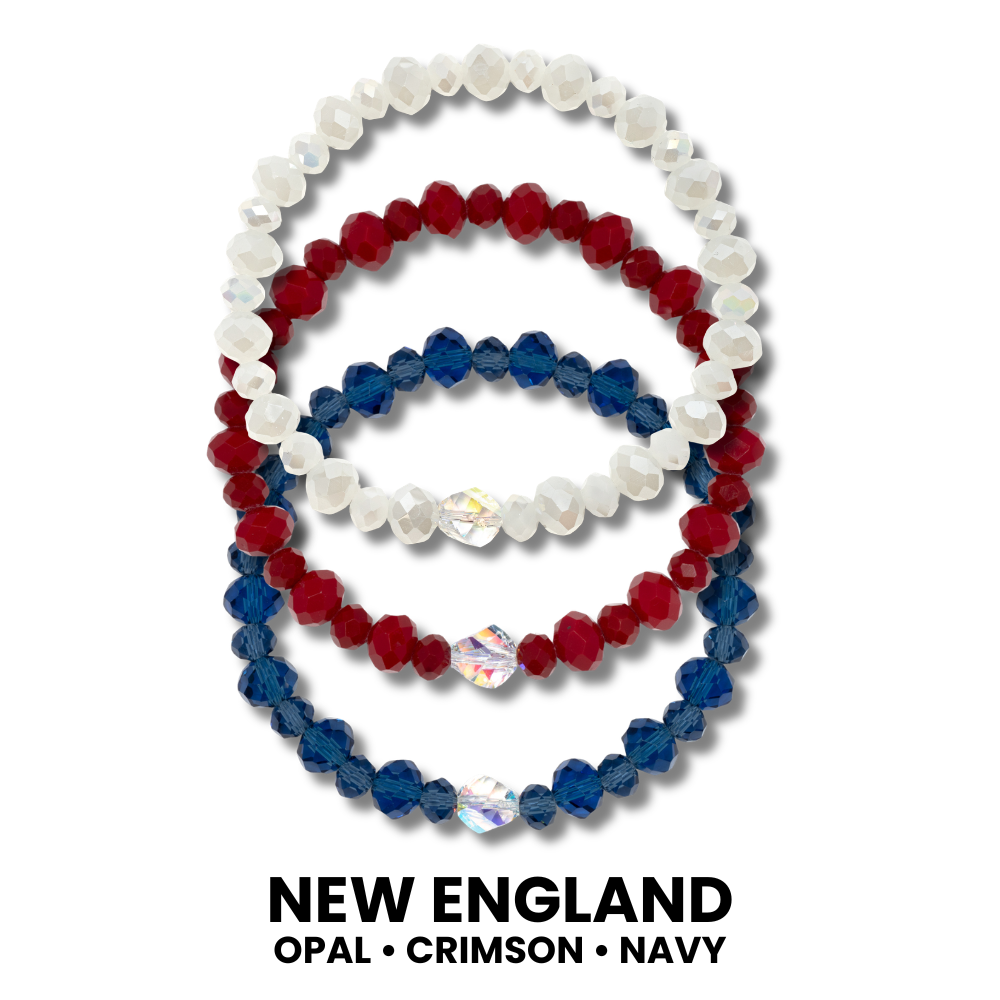 White Opal, Deep Red and Navy Crystal Stretch Bracelets on a white background.