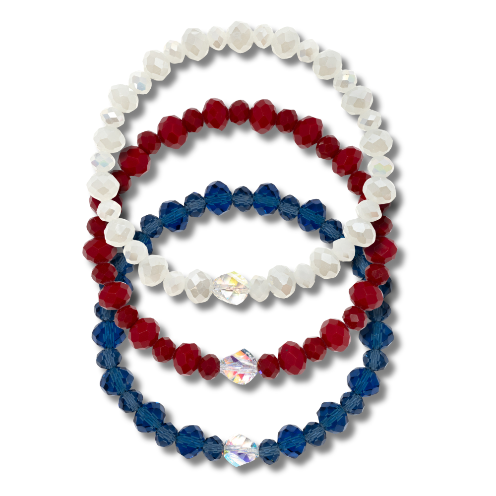 White Opal, Deep Red and Navy Crystal Stretch Bracelets on a white background.