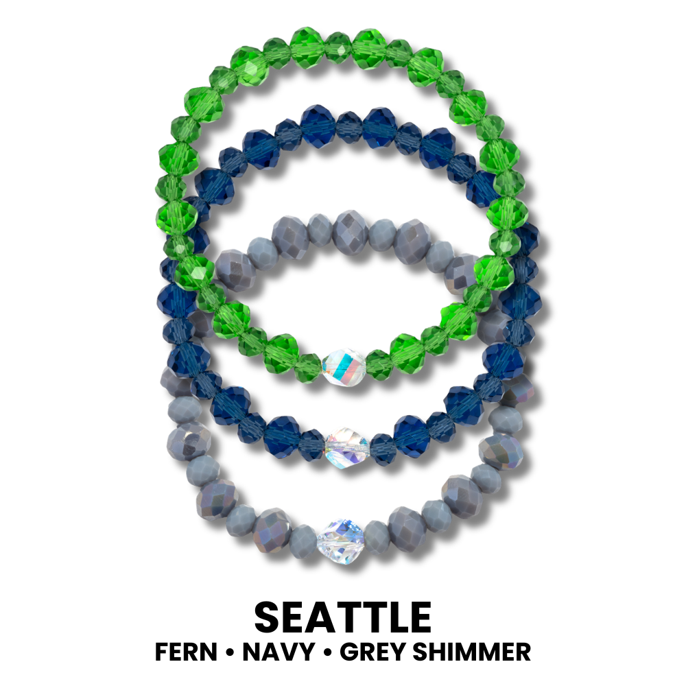 3 crystal stretch bracelets.