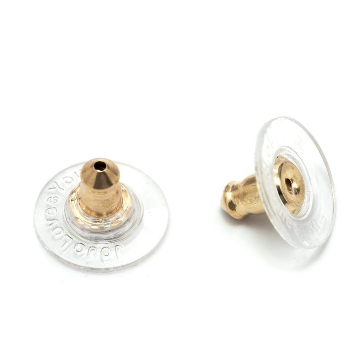 Round gold and clear disc earring backs.